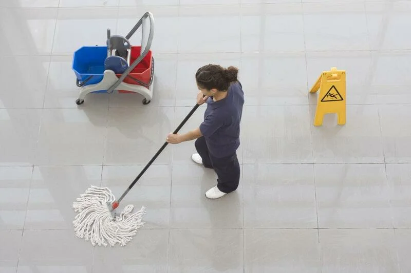 commercial cleaner doing floor wiping 