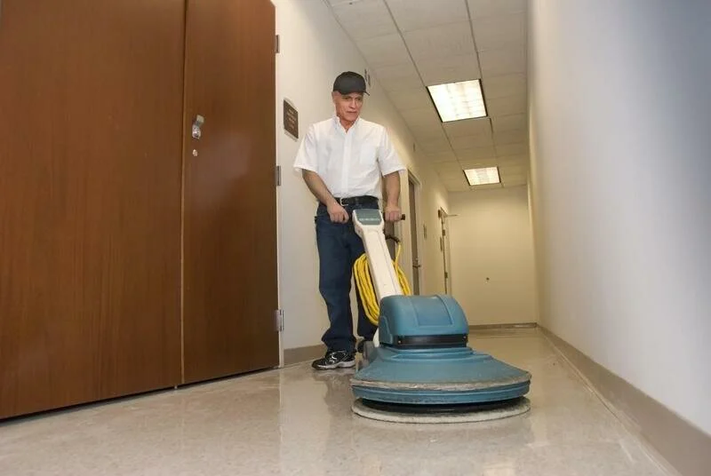 commercial cleaner doing floor cleaning